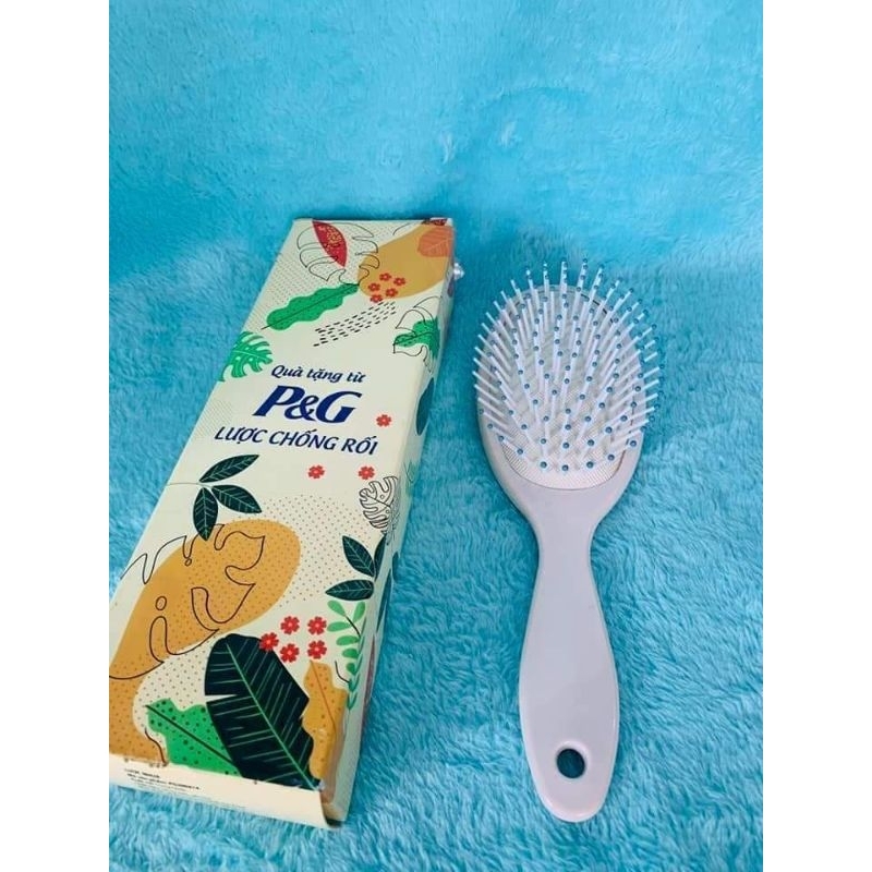 lược chải tóc chống rối kèm massa da đầu