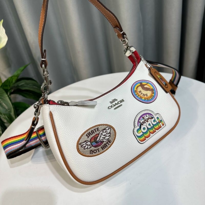 Túi C0ach Teri dáng thuyền mới hoạ tiết icon xinh xắn trẻ trung