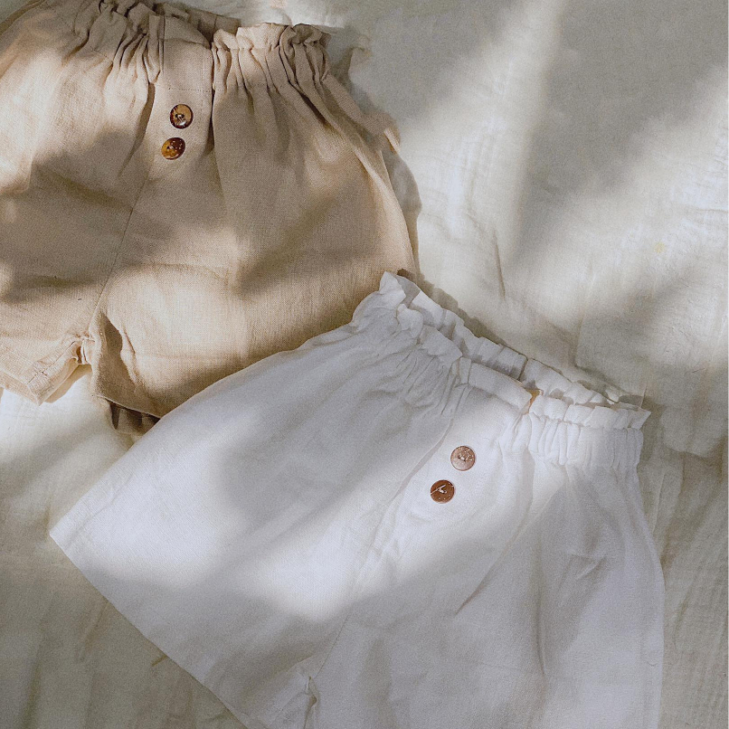 Quần short chất liệu linen xinh xắn cho bé gái THE LITTLE AVOCADO vàng nâu/trắng