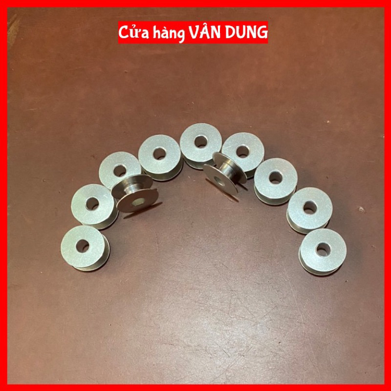 Suốt đánh chỉ máy may 1 kim,dùng cho máy may công nghiệp.5 con suốt 10.000