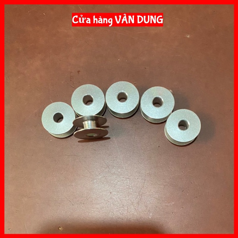 Suốt đánh chỉ máy may 1 kim,dùng cho máy may công nghiệp.5 con suốt 10.000