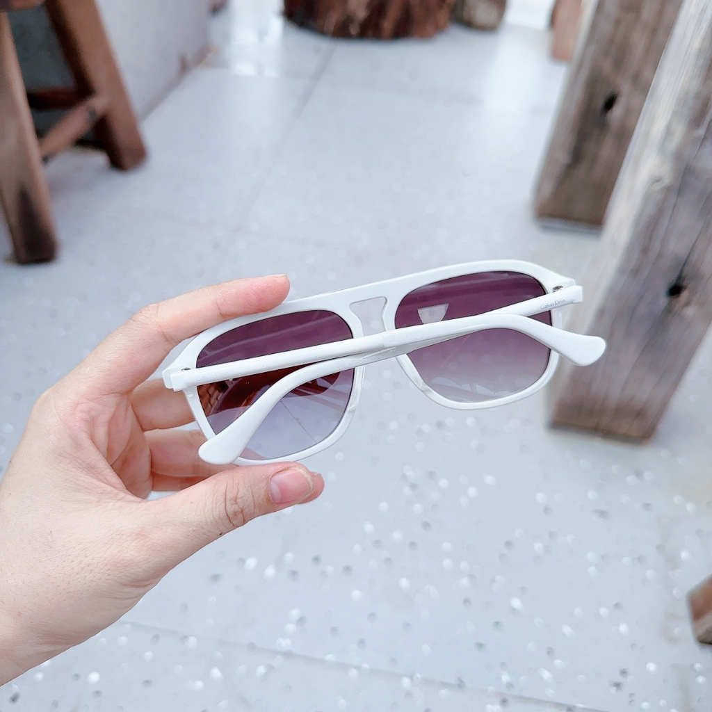 Kính mát nữ Calvin Klein gọng trắng, tròng xám CK4317S