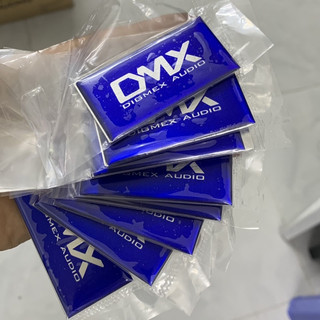 Tem logo dmx, giá 2 cái, kích thước 6cm x 3cm.