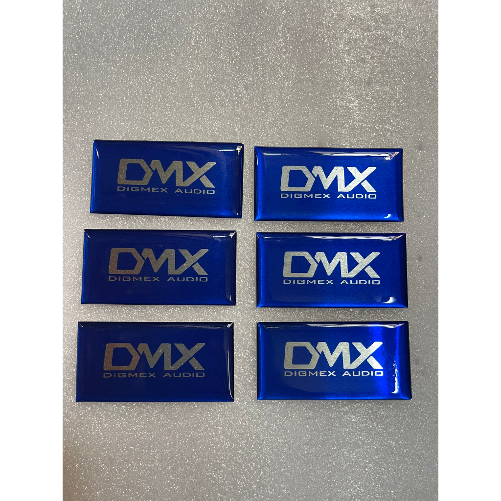 Tem logo DMX, giá 2 cái, kích thước 6cm x 3cm.