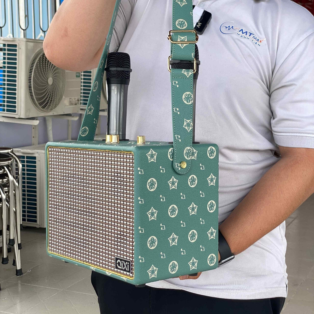 Loa xách tay Bluetooth Karaoke Qixi SK2039 Kèm 2 Micro Khôg Dây, Bass Uy Lực Tiếng Treble Trong Trẻo thiết kế sang trọng