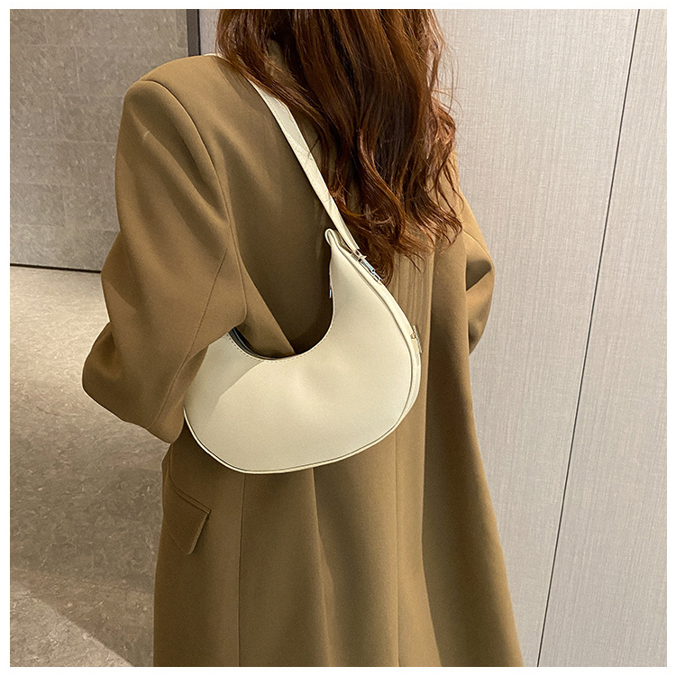 Túi xách nữ kẹp nách kiểu yên ngựa da trơn có khóa kéo thời trang, có hai màu đen và trắng