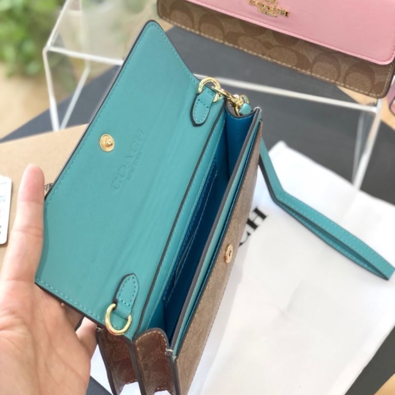 VÍ COACH FOLDOVER WRIST