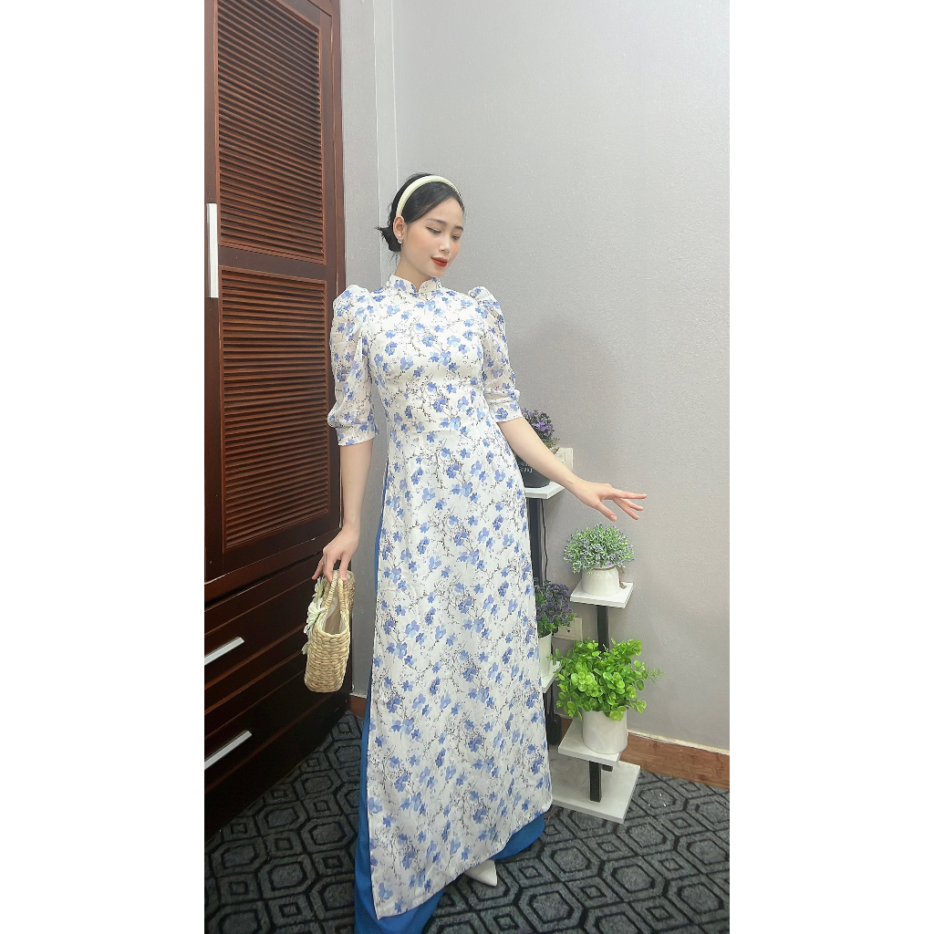 Áo dài hoa nhí xanh dương vai bồng tay lỡ form truyền thống tà dài tôn da nhẹ nhàng hot 2023 saam