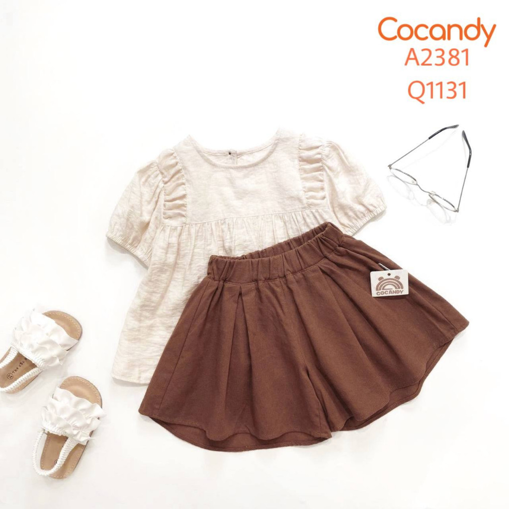 Set đồ cho bé - Áo cộc babydoll BE trơn và Quần cộc NÂU giả váy cho bé của COCANDY mã A2381,Q1131