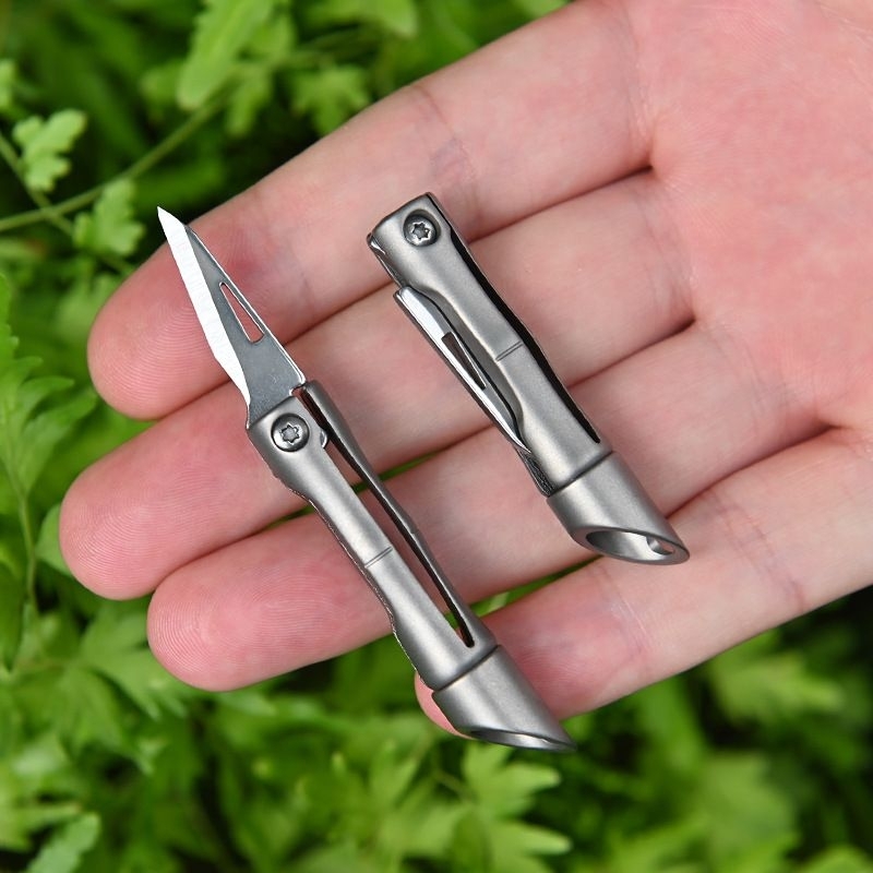 móc khóa titanium rạch thùng hình đốt trúc độc đáo
