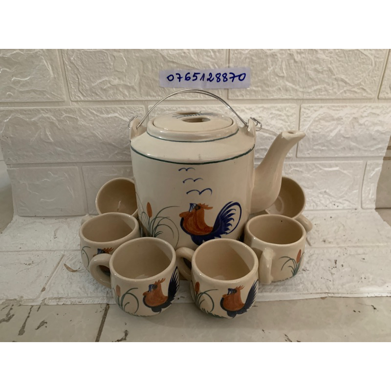 bộ bình trà con gà (1 lit 3 ) và 6 tách con gà