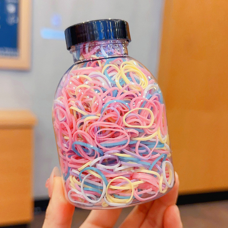 Set 1000 Thun Cột Tóc Co Giãn Nhiều Màu Kèm Bình Đựng