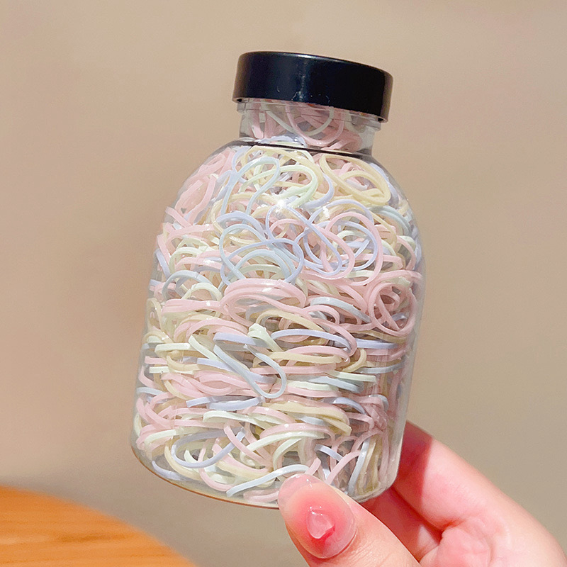 Set 1000 Thun Cột Tóc Co Giãn Nhiều Màu Kèm Bình Đựng