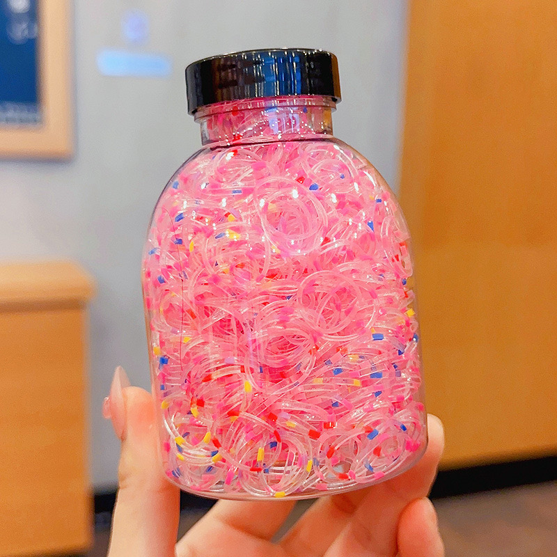 Set 1000 Thun Cột Tóc Co Giãn Nhiều Màu Kèm Bình Đựng