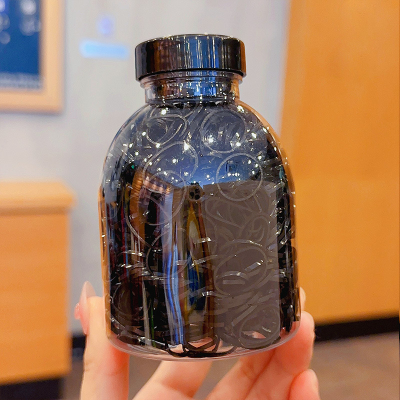 Set 1000 Thun Cột Tóc Co Giãn Nhiều Màu Kèm Bình Đựng