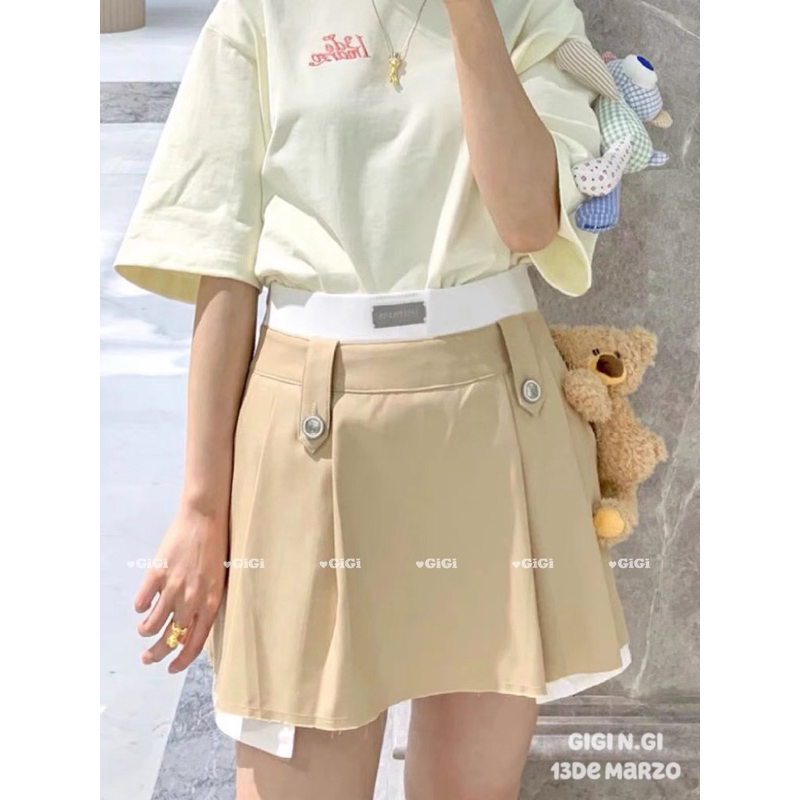 Chân váy 13de marzo nâu xếp ly phối trắng đính gấu bông