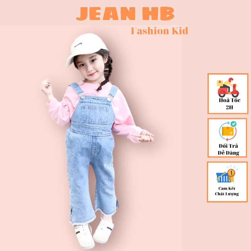 Yếm Jean ống loe xẻ tà cho bé gái đính nơ sau lưng từ 7 tuổi đến 10 tuổi.