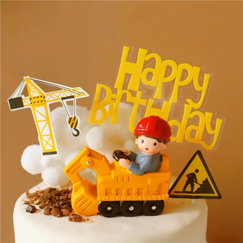 Trang trí sứ cậu bé lái xe cẩu công trình