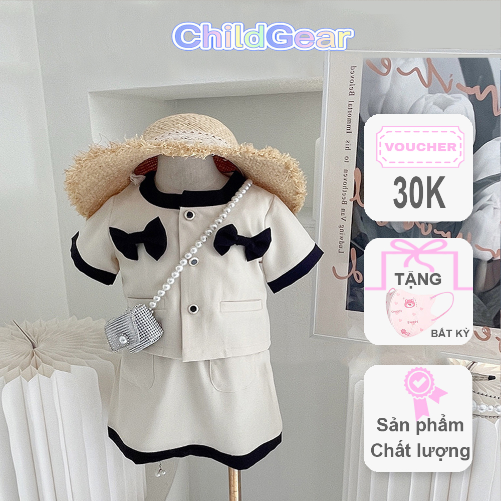 Váy trắng viền đen đính nơ phong cách Hàn Quốc dễ thương, thoải mái cho bé gái đi học, đi chơi, đi du lịch CHILDGEAR