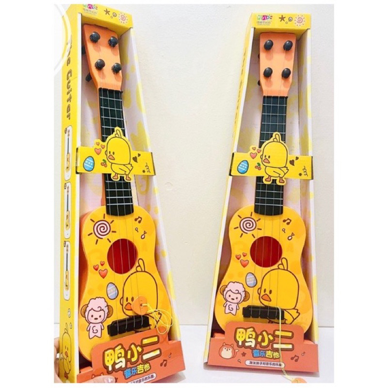 Đàn Ukelele, Đàn guitar con vịt vàng cho bé bằng nhựa phát ra tiếng nhạc