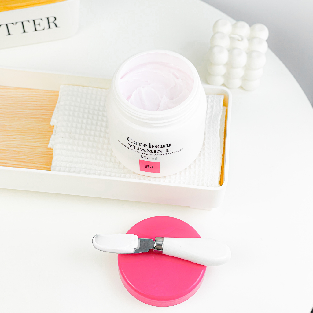 Kem dưỡng da toàn thân Vitamin E Carebeau Thái Lan màu hồng 250ml