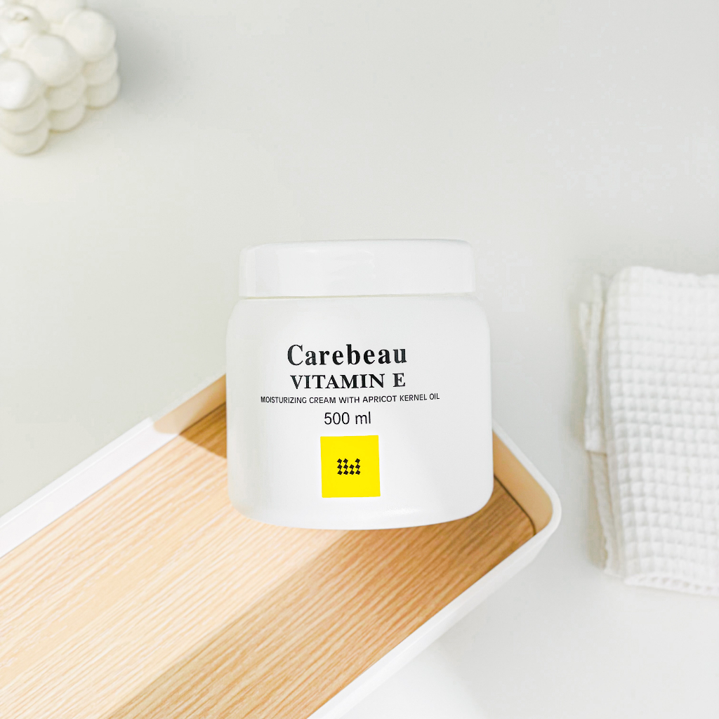 Kem dưỡng da toàn thân Vitamin E Carebeau Thái Lan màu hồng 250ml