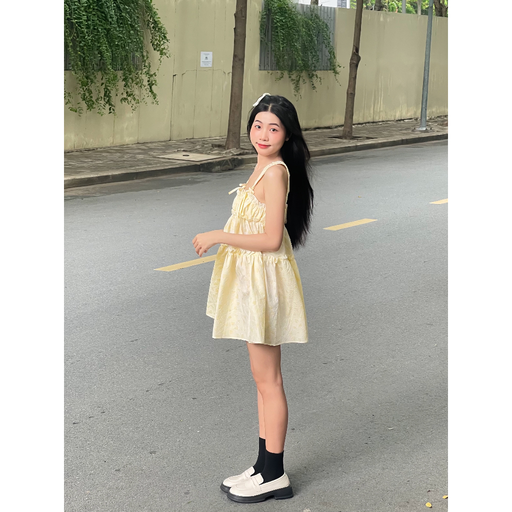 Lolie Dress - đầm babydoll hai dây cột nơ chất gấm xốp in nổi