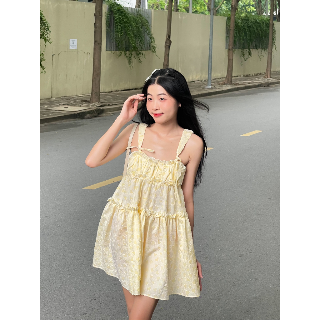 Lolie Dress - đầm babydoll hai dây cột nơ chất gấm xốp in nổi
