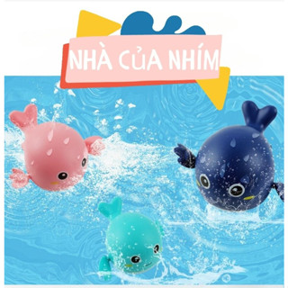 Đồ chơi cá heo con vặn cót bơi trong nước cho bé.