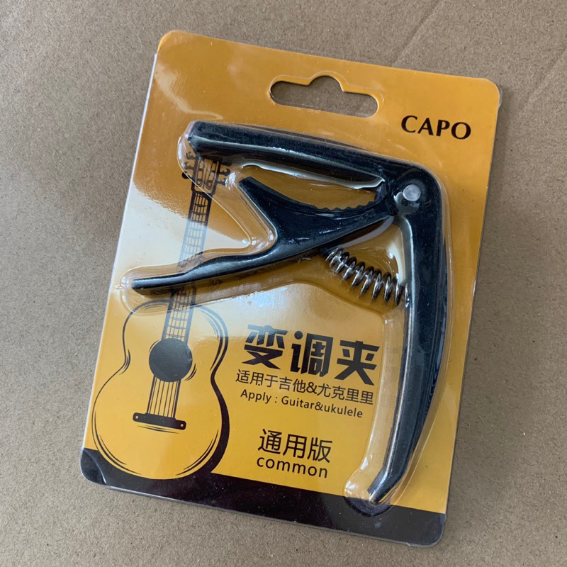 Capo đàn guitar