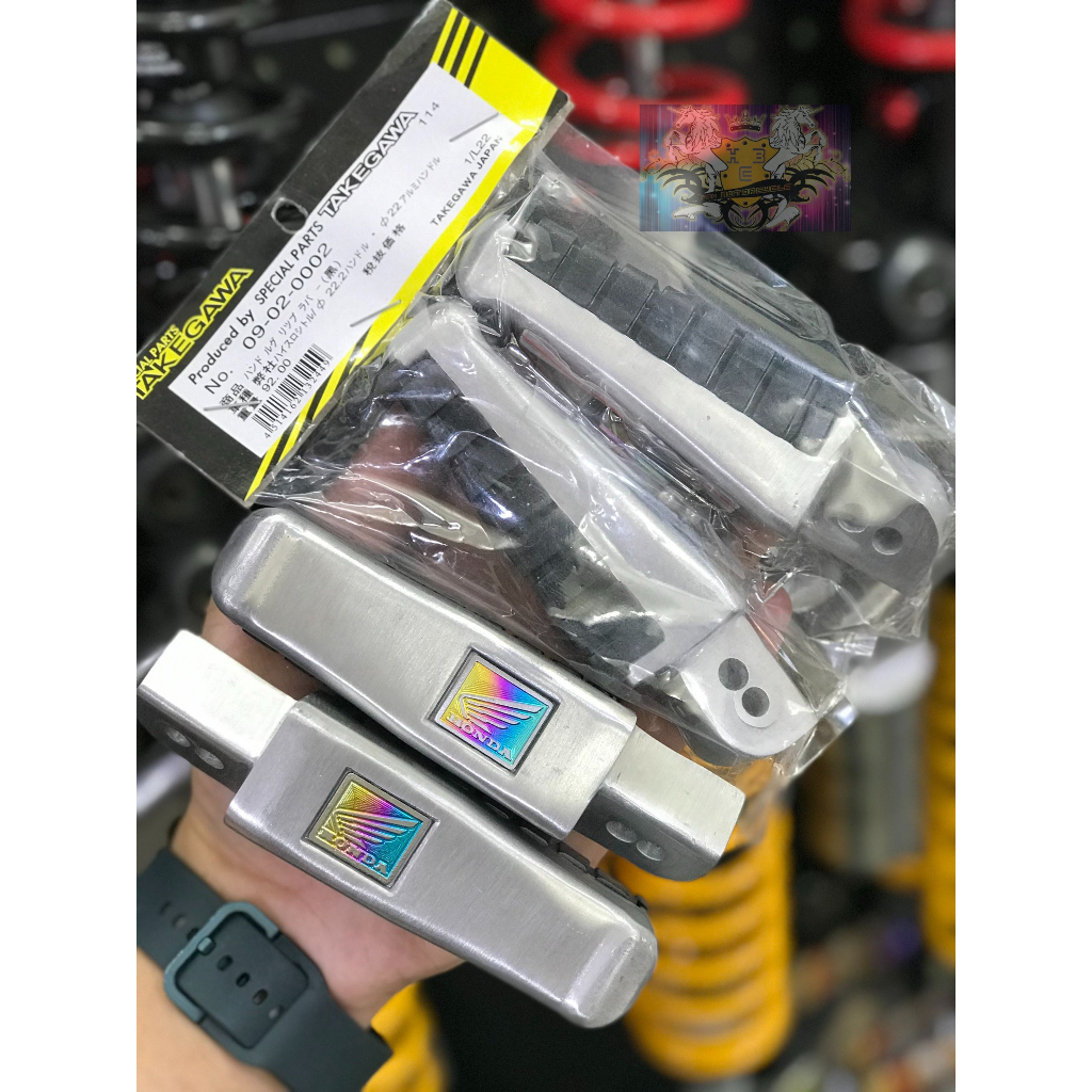 Gác chân cánh chim Honda (Tặng tem cánh chim Honda Titan)