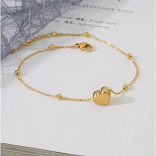 Lắc chân titan tim phối bi