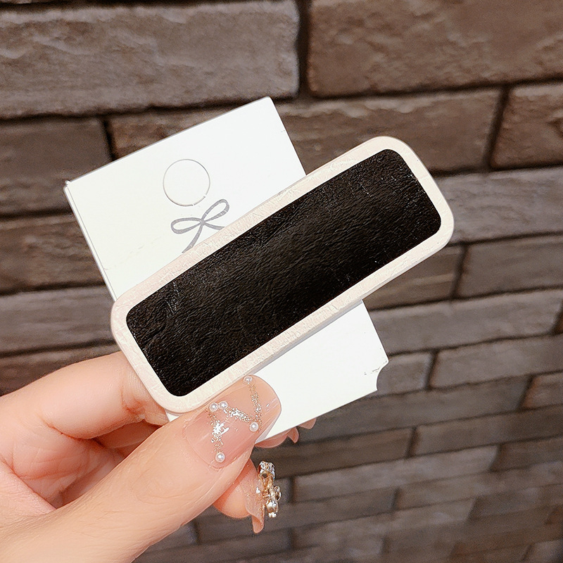 Kẹp mái chất da sang chảnh - UniLabel