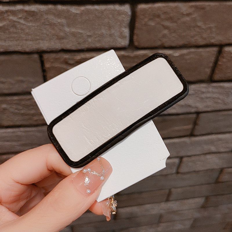 Kẹp mái chất da sang chảnh - UniLabel