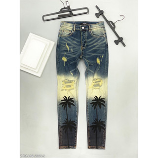 Quần jean bò nam Amiri skinny wash xanh vàng thủng gối tua viền dập hình cây dừa tư thế boy phố