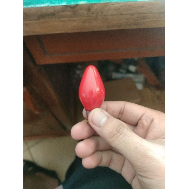 Bóng đèn quả nhót gắn bàn thờ ông địa thần tài