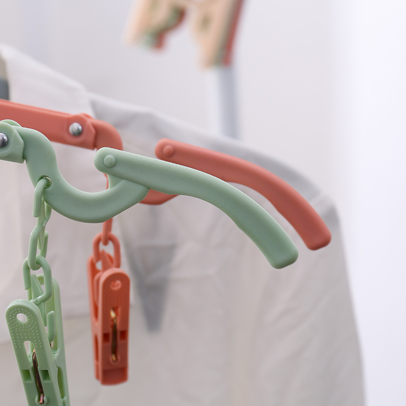 [siêu rẻ] Móc nhựa treo quần áo gấp gọn khi đi du lịch