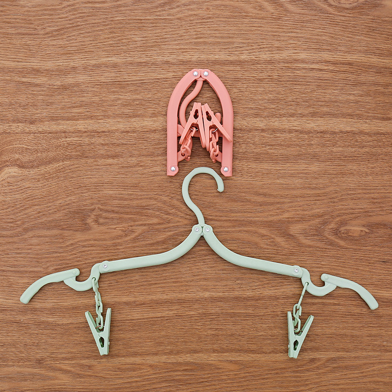 [siêu rẻ] Móc nhựa treo quần áo gấp gọn khi đi du lịch