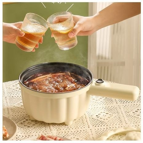 Nồi lẩu điện mini tặng kèm giá hấp, nồi dung tích 2 lít có lõi tráng nhiều lớp chống dính, tặng thìa cùng miếng cọ rửa