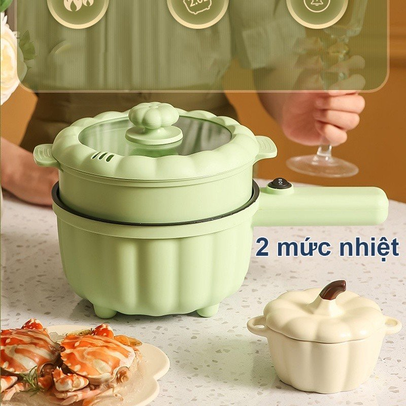 Nồi lẩu điện mini tặng kèm giá hấp, nồi dung tích 2 lít có lõi tráng nhiều lớp chống dính, tặng thìa cùng miếng cọ rửa