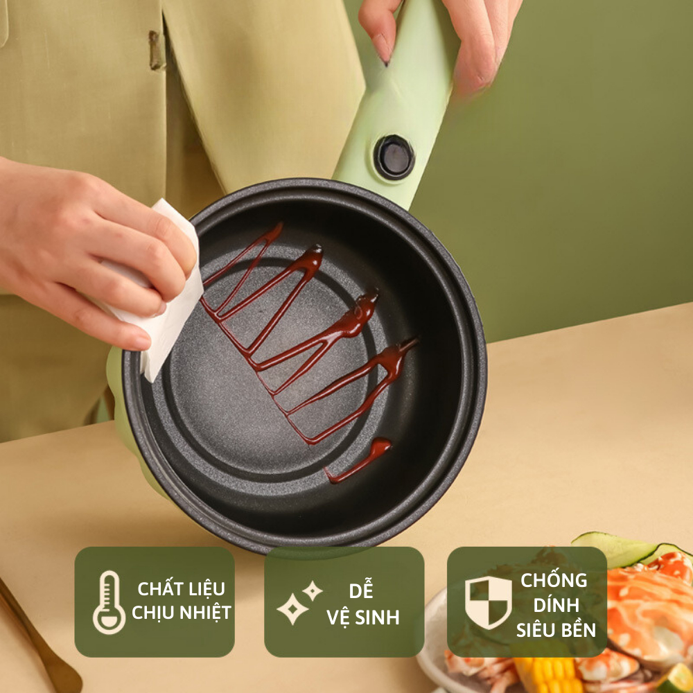 Nồi lẩu điện mini tặng kèm giá hấp, nồi dung tích 2 lít có lõi tráng nhiều lớp chống dính, tặng thìa cùng miếng cọ rửa