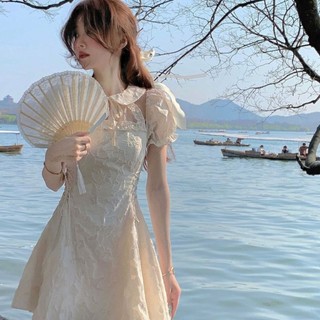 Váy cổ sen buộc dây- thắt eo mặc được hai kiểu
