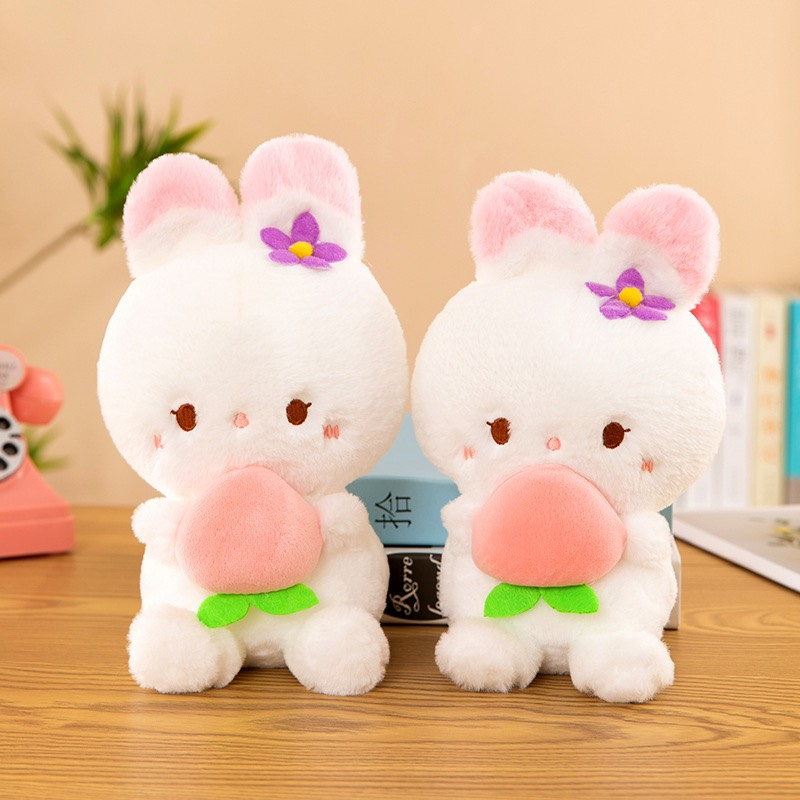 Thú bông thỏ ôm đào
