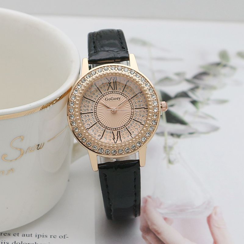 Đồng hồ nữ GOGEY02  dây da mặt tròn đính đá full viền sang trọng