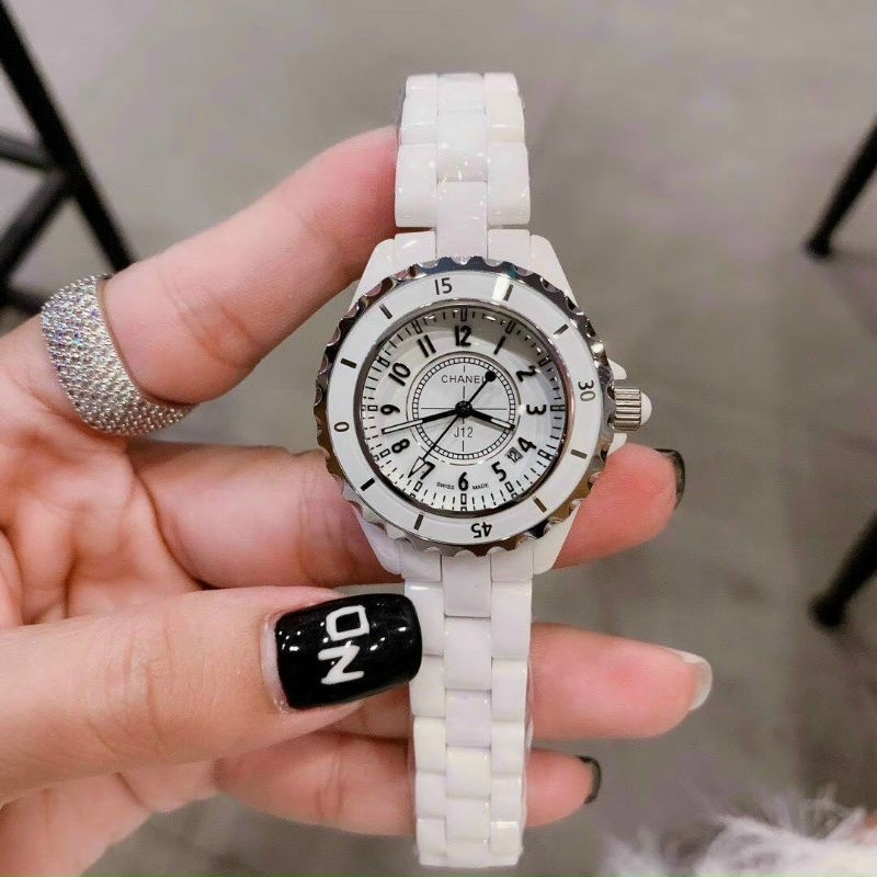 Đồng Hồ Nữ Đá Caremic chanal có lich.