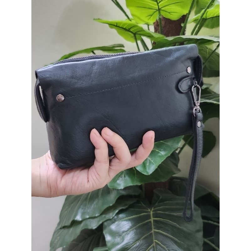 Ví cầm tay da thật