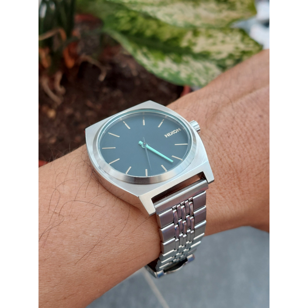 Đồng hồ nam Nixon mặt xanh dây thép chạy pin hàng Si