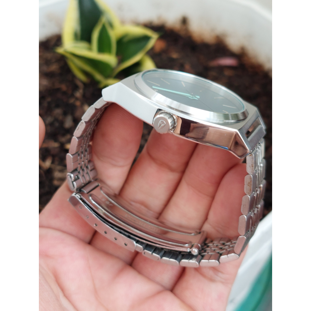 Đồng hồ nam Nixon mặt xanh dây thép chạy pin hàng Si