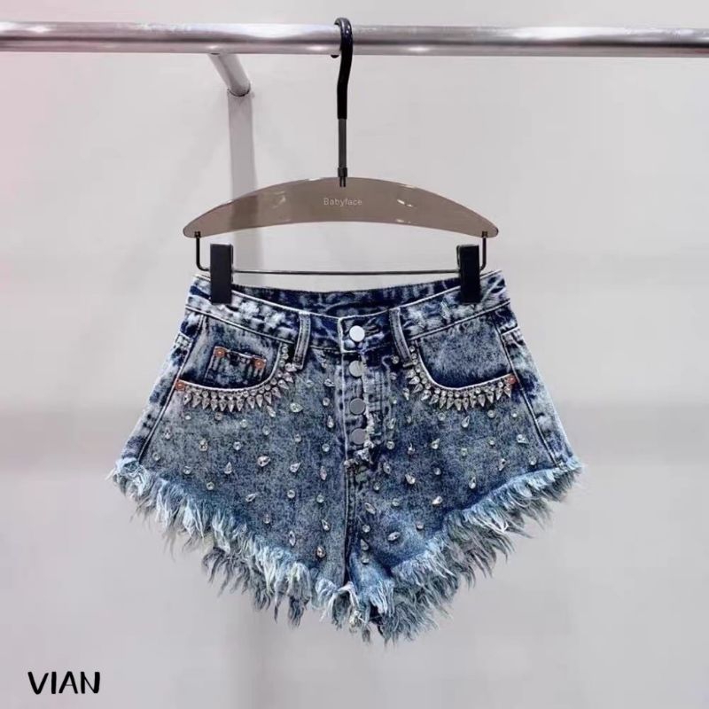 Quần short jean đính đá tua rua gấu