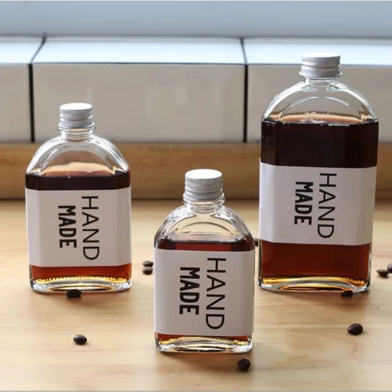 Chai thủy tinh dẹt vuông xén vai